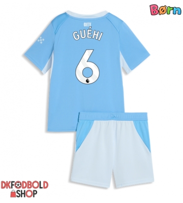 Manchester City Marc Guehi #6 Hjemmebanesæt Børn 2026-27 Kort ærmer (+ korte bukser)